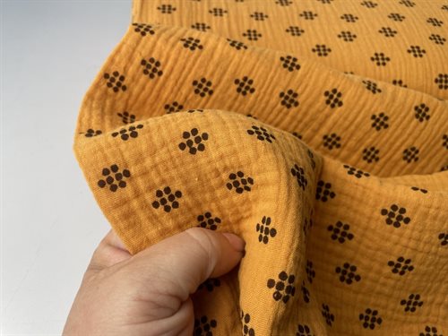 Gauze - florlet dobbelt gauze i lys karry med brune motiver